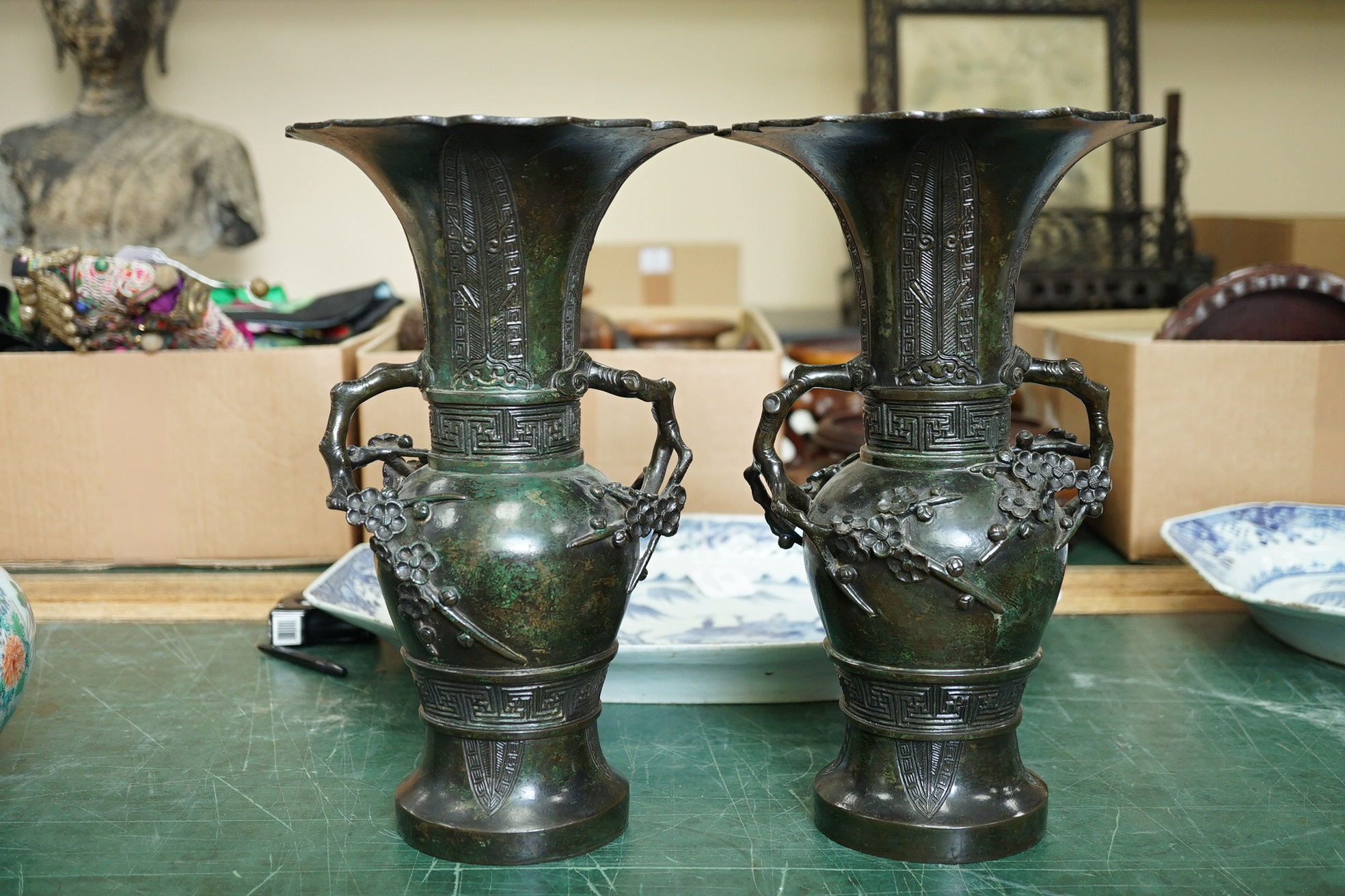 A pair of Chinese bronze gu-shaped vases, Qing dynasty